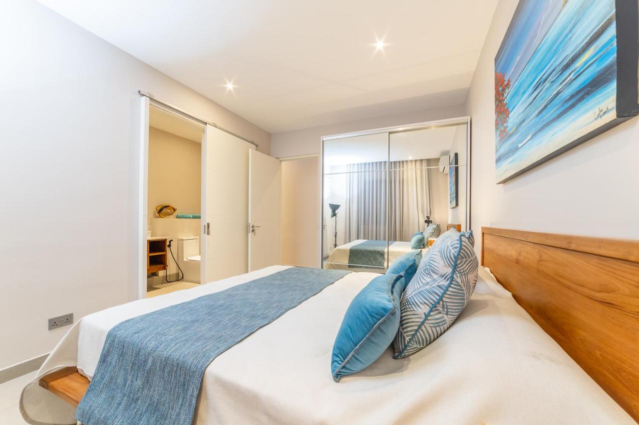 Penthouse 13 - One Bay Residence With Private Rooftop Terrace And Dip In Pool Pereybere Beach Exteriér fotografie
